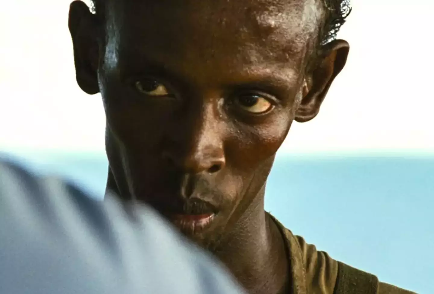 Barkhad Adbi was cast in Captain Phillips following an open casting call.