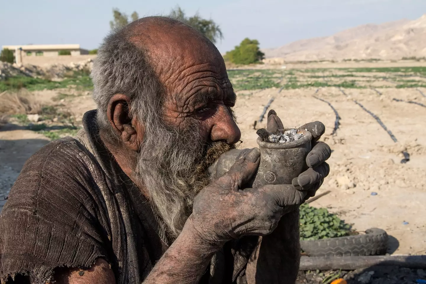 Amou Haji was dubbed the world's dirtiest man after going more than 60 years without a wash. (AFP via Getty Images)