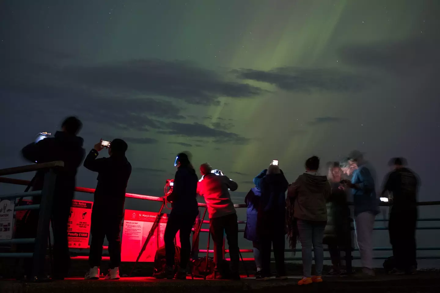 People trying to capture the Northern Lights in Whitley Bay, near Newcastle, last weekend. (Ian Forsyth/Getty Images)