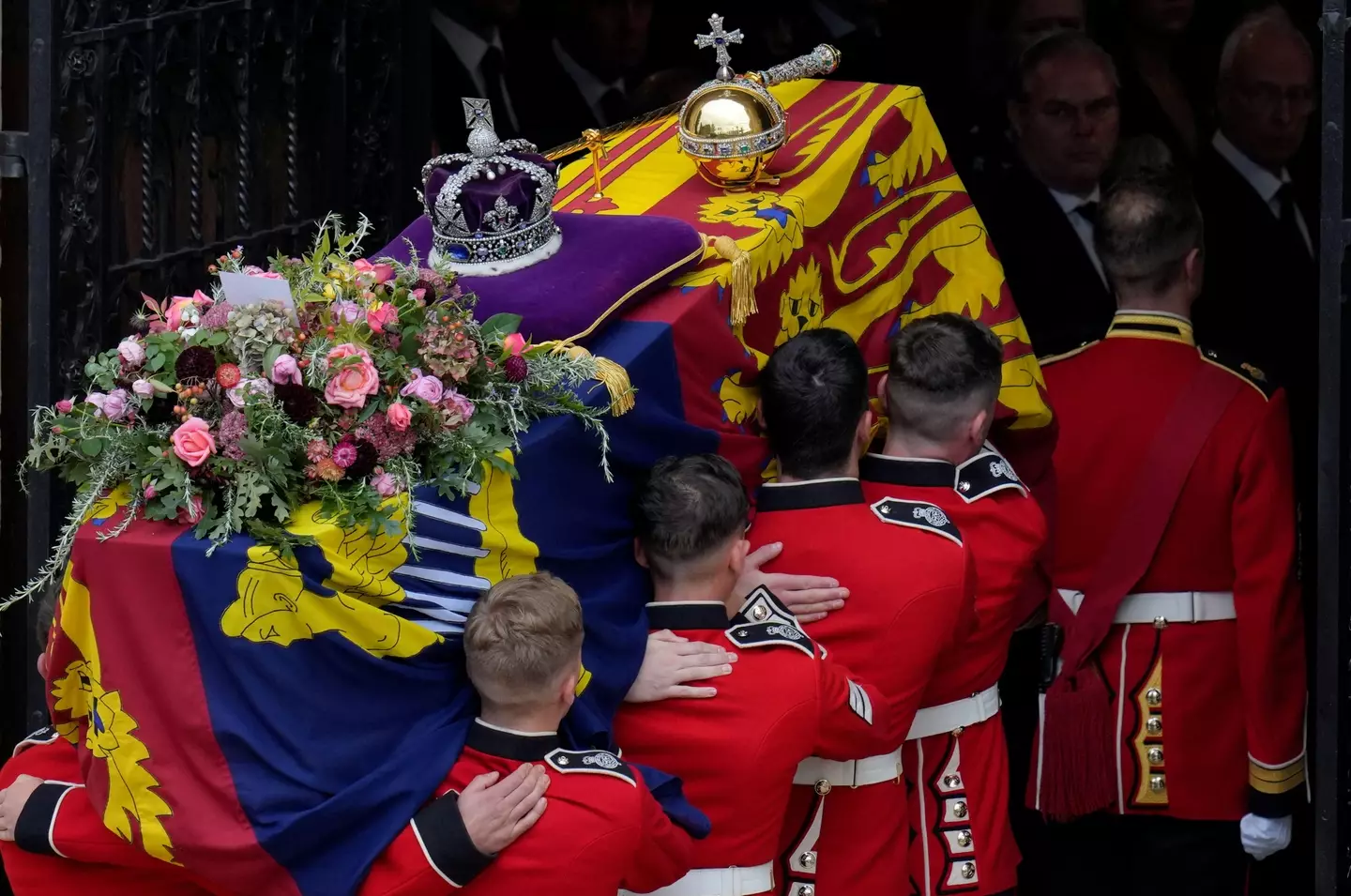 The coffin of Queen Elizabeth II is carried into Saint George's chapel for her funeral at Windsor castle.
