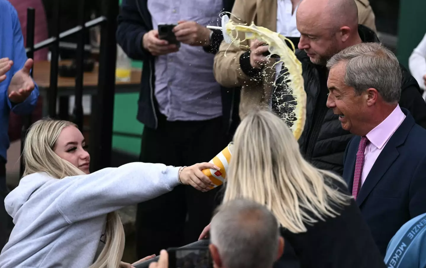 She caught him off guard and people loved it.  (BEN STANSALL/AFP via Getty Images)