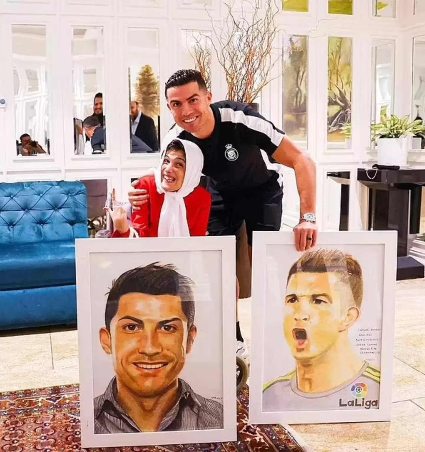 Ronaldo reportedly kissed painter Fatima Hamimi on the cheek.
