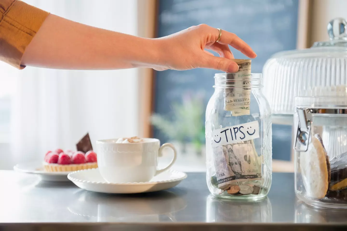 Tip jars are commonplace in some places around the world (Getty Stock Images)