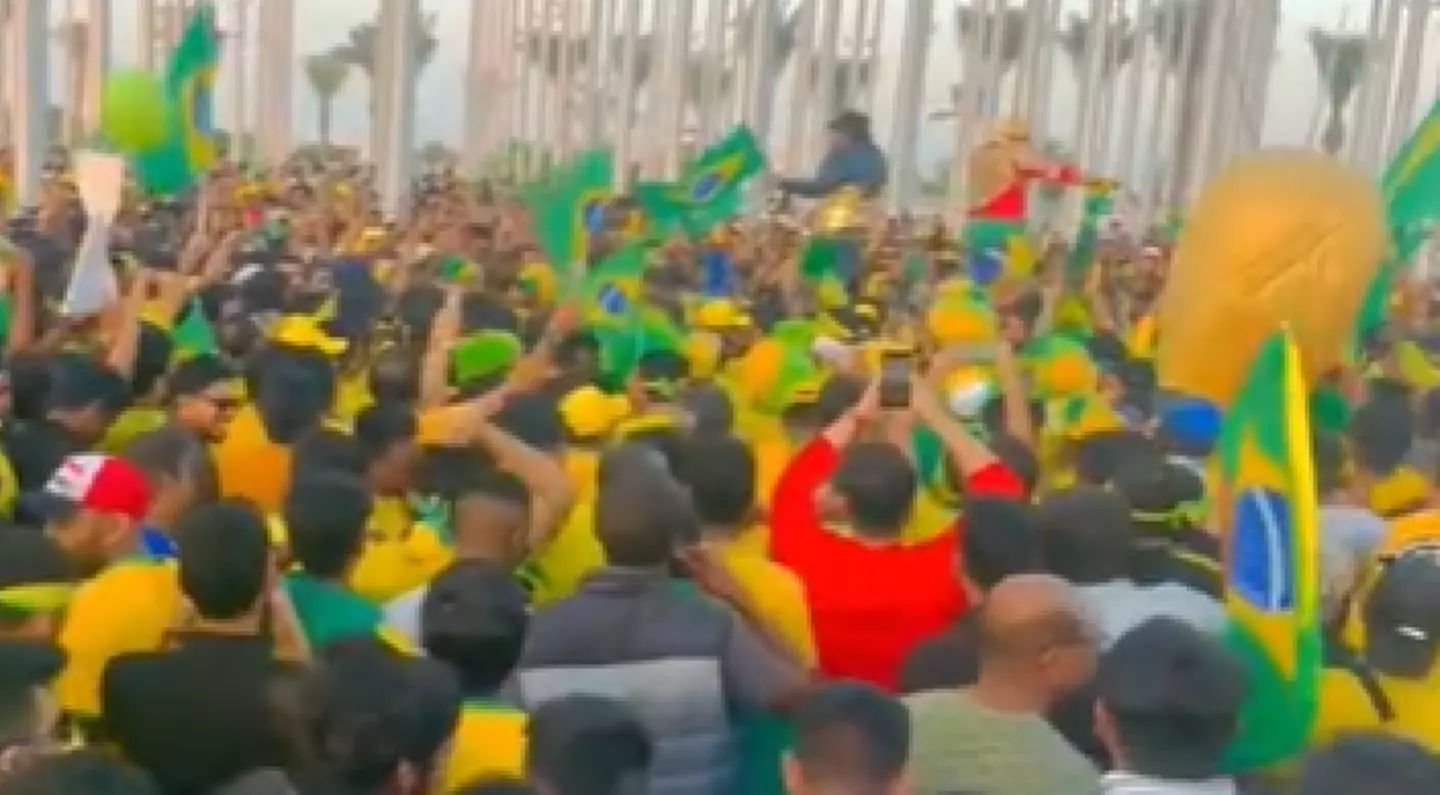 Large crowds of people bearing the shirts and flags of other nations playing at the World Cup have also been filmed.