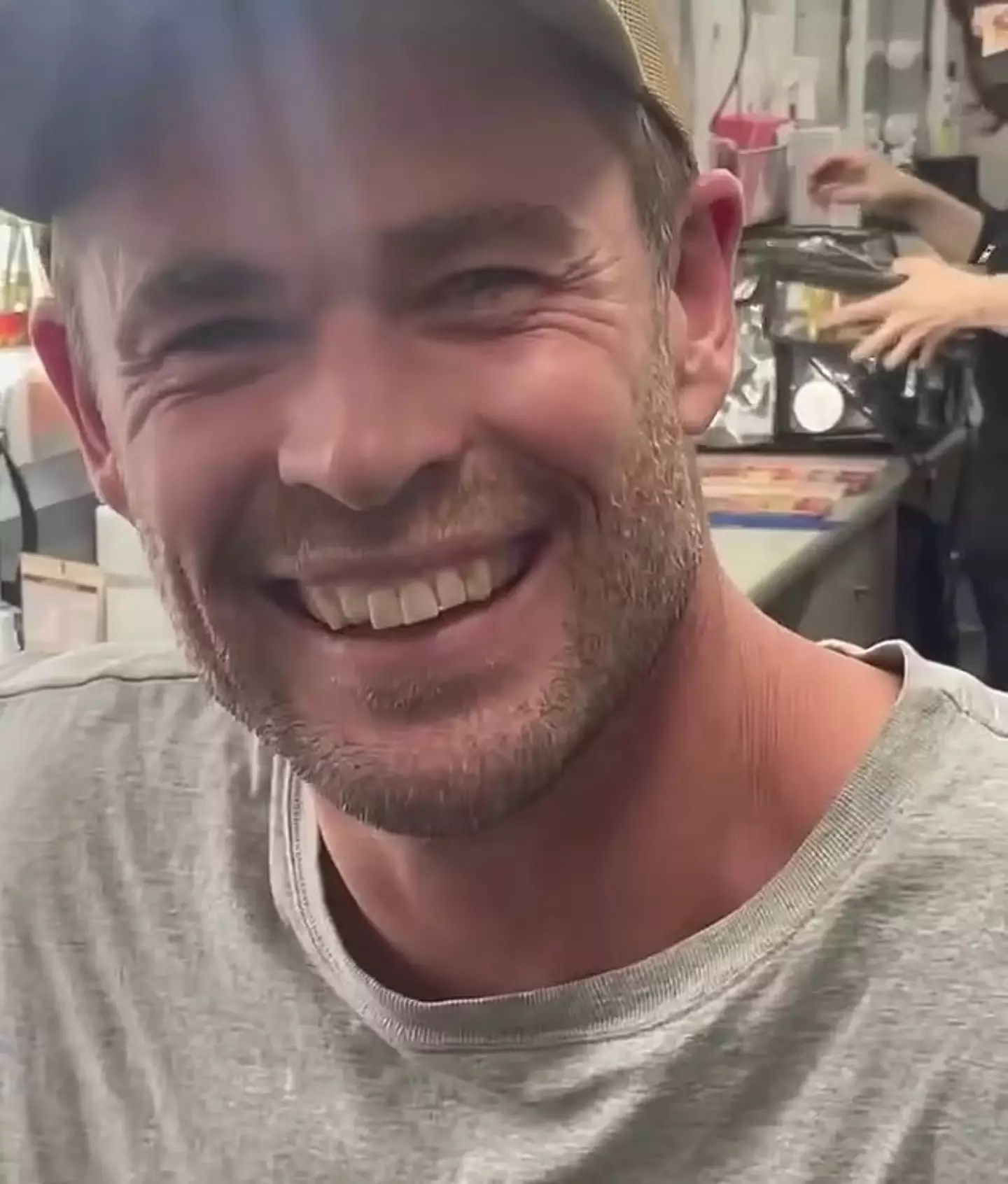 Hemsworth's smile looked a lot different than usual in the video (Instagram/@chrishemsworth)