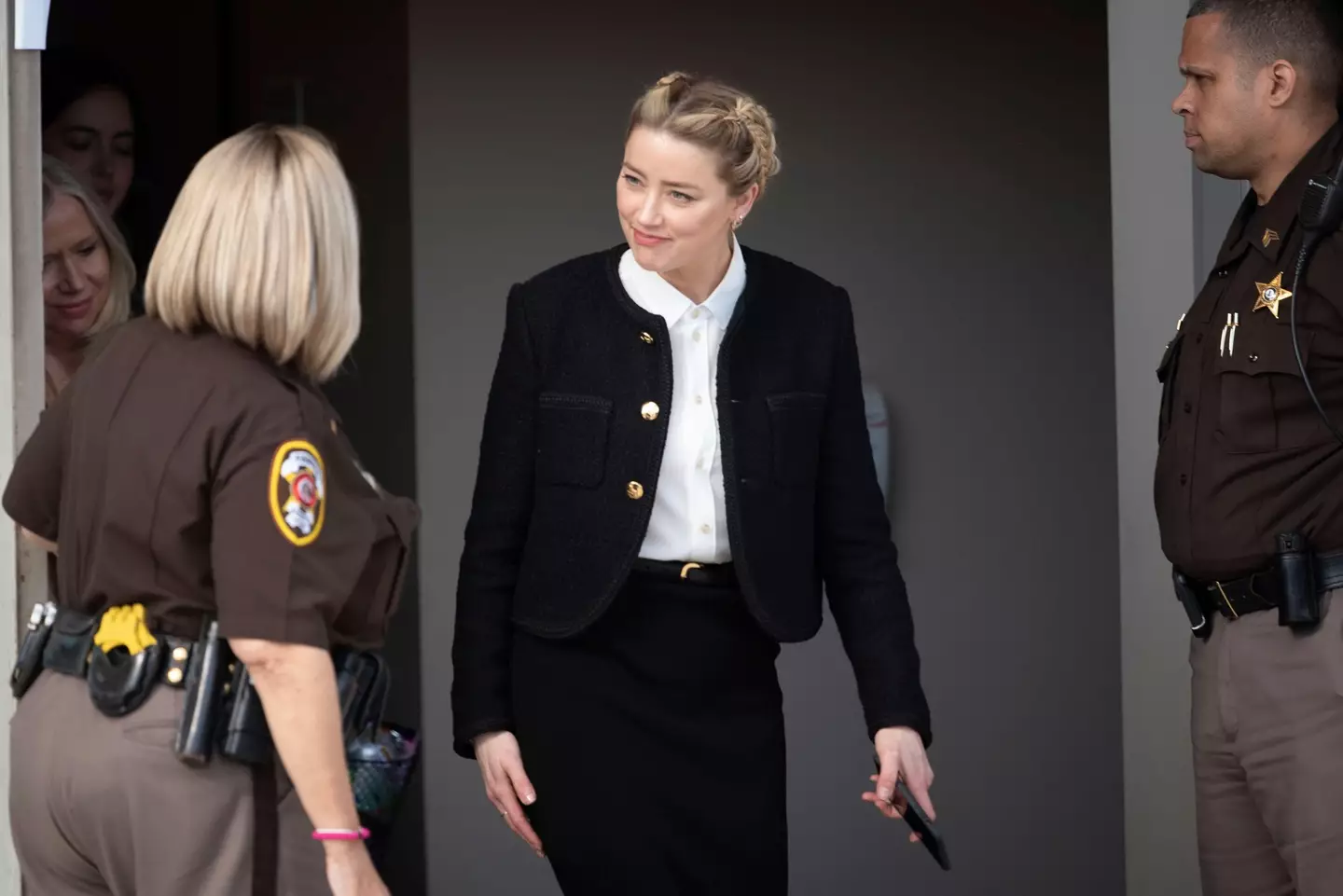 Amber Heard departs the Fairfax County Courthouse, in Fairfax, during the civil trial between her and Johnny Depp.