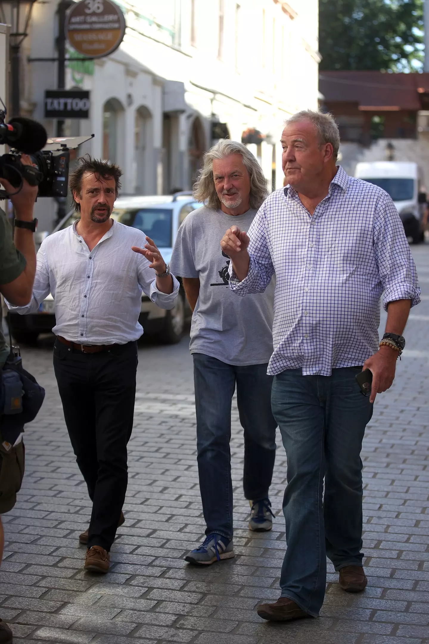 May with Top Gear and Grand Tour co-hosts Richard Hammond and Jeremy Clarkson. (Vito Corleone/SOPA Images/LightRocket via Getty Images)