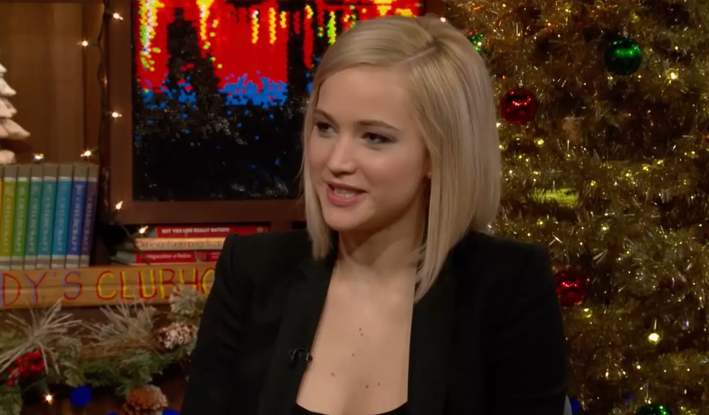 Jennifer Lawrence kept her cards close to her chest regarding her alleged romance with Chris Martin.