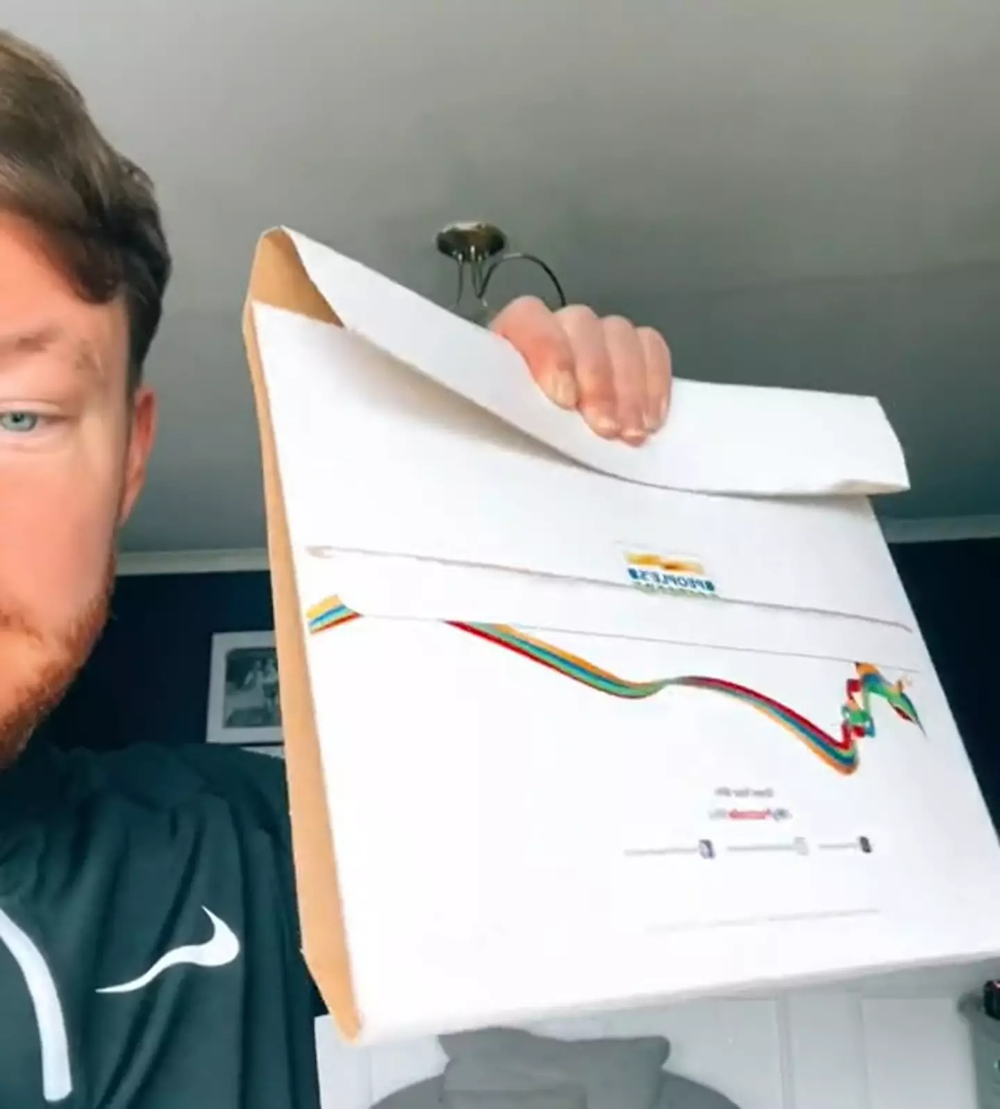 The Bolton man got a package from the Postcode Lottery and hoped it might be a cheque. (TikTok/@chriscork89)