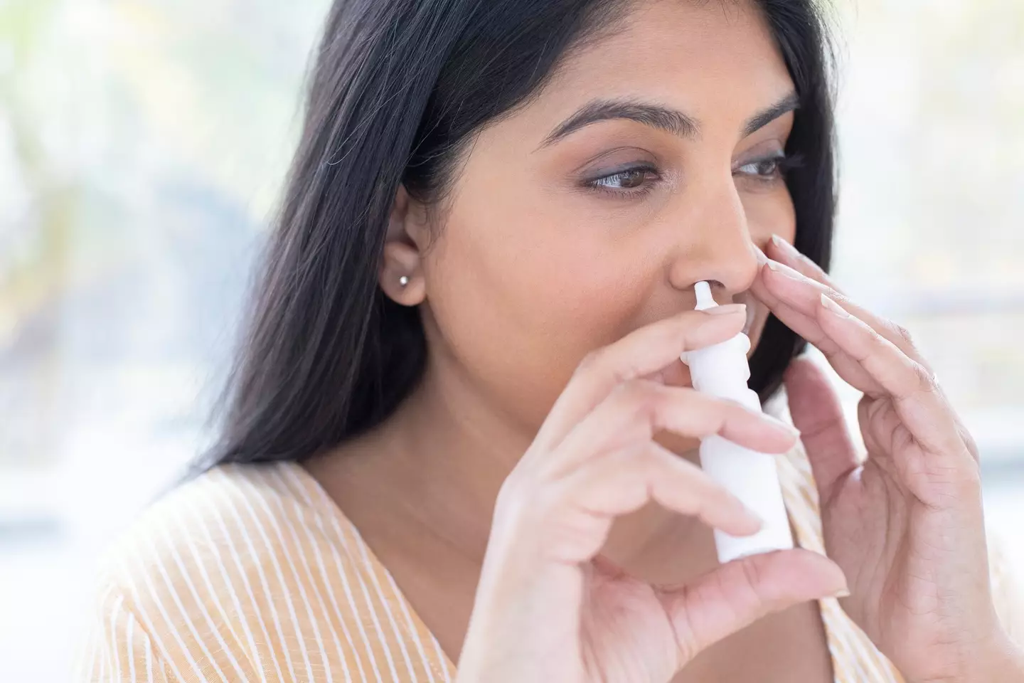 Nasal sprays are a common medicine used to calm the symptoms of hay fever (Getty Stock Images)