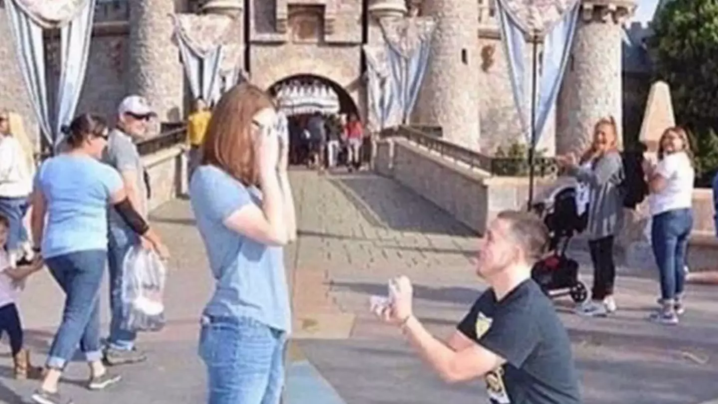Couple mocked for Disneyland proposal as someone ruined their big moment in the background