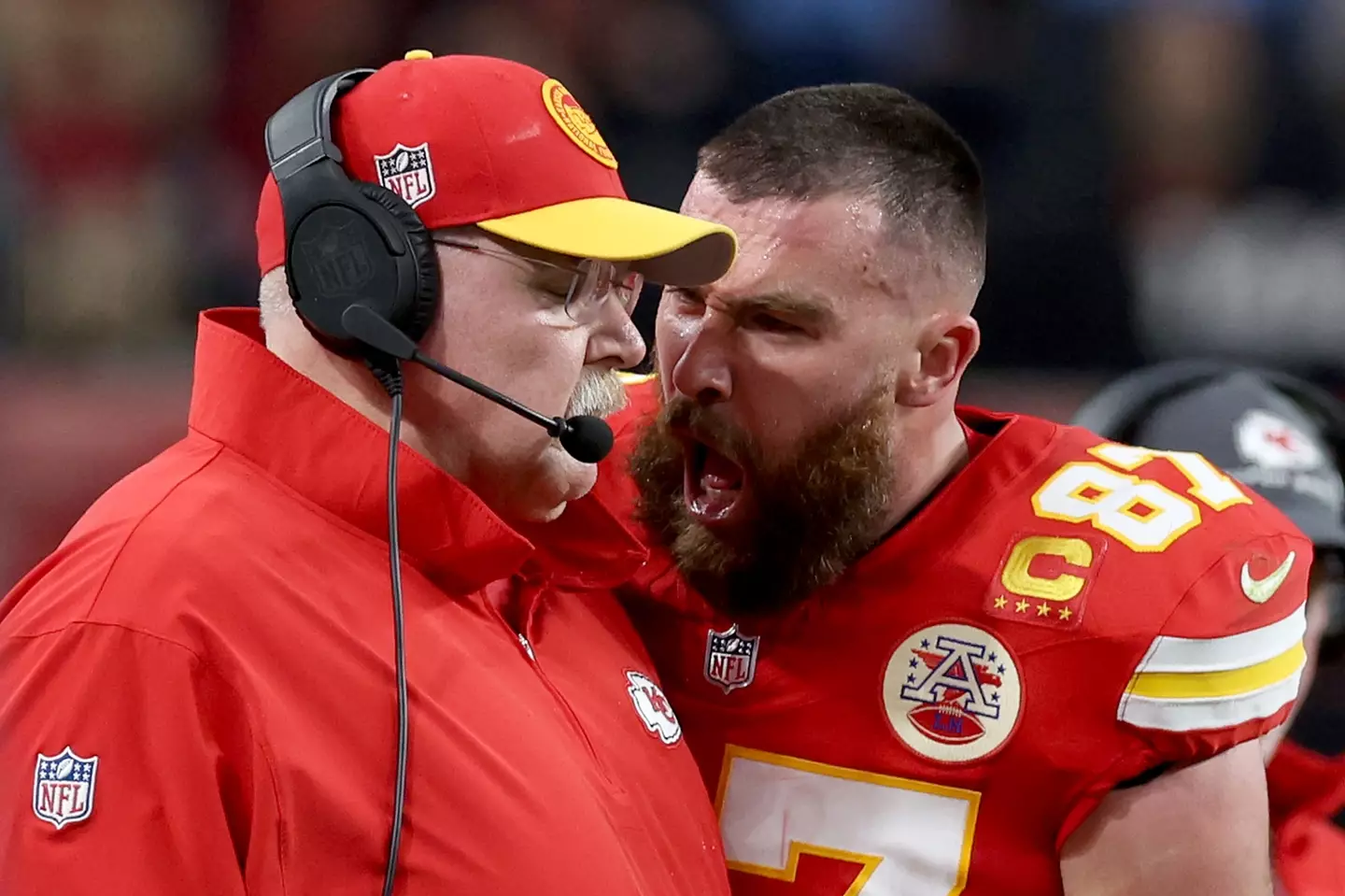 Travis Kelce was criticised for getting up close and personal with his coach Andy Reid during the Super Bowl.
