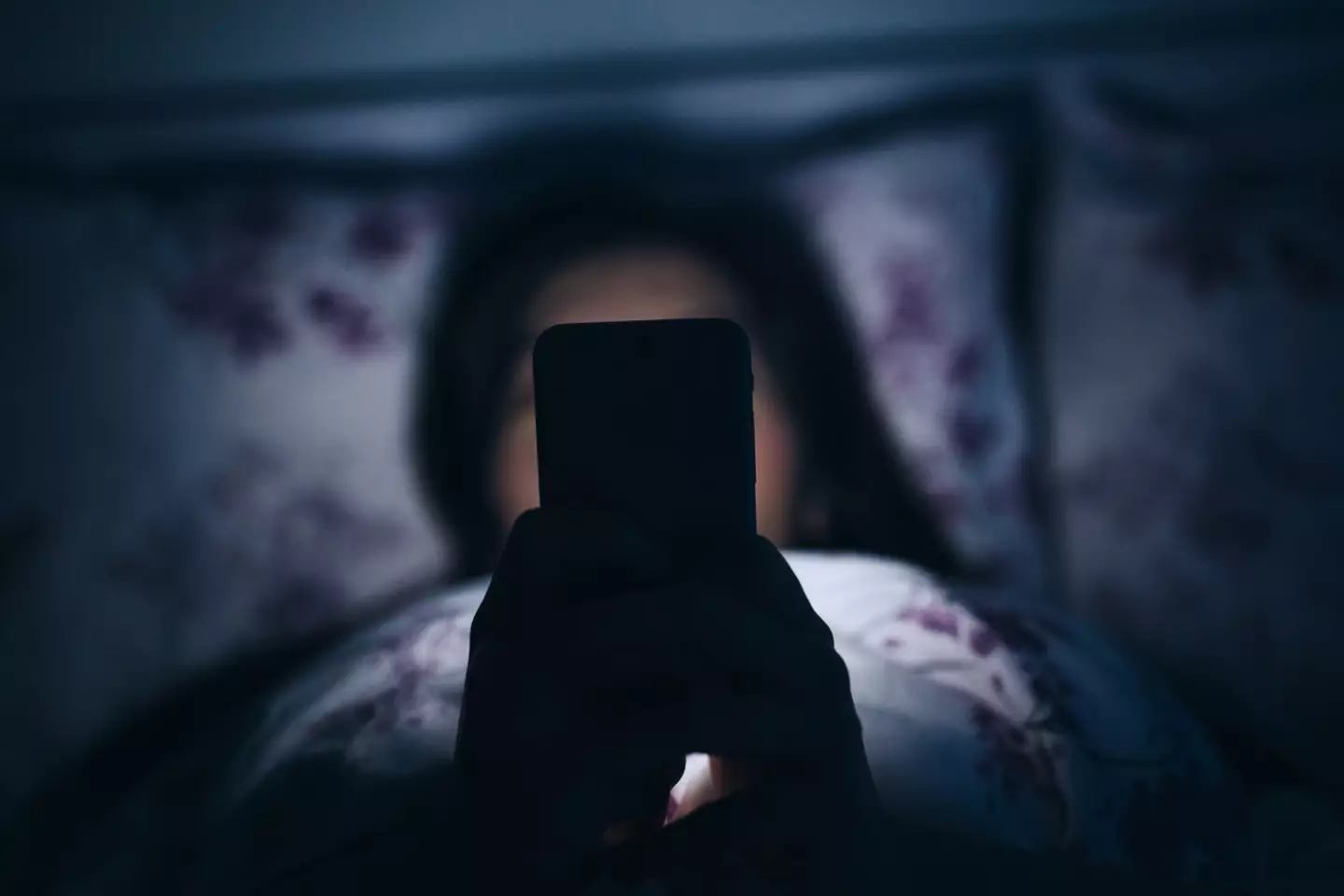 Scrolling through TikTok at 1am... yep, we've all been there. (Getty Stock Image)