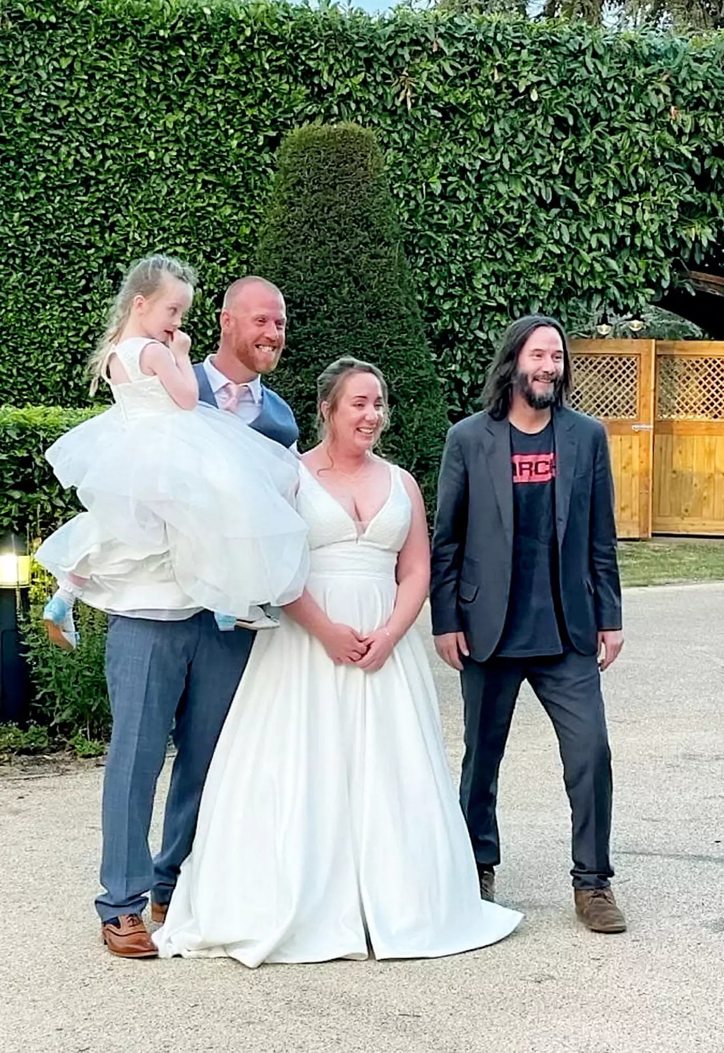 Keanu got into some of the wedding photos.