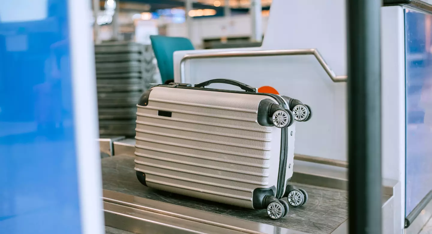 Checking in early doesn't mean your bag will necessarily come out last. (Getty Stock Photo)