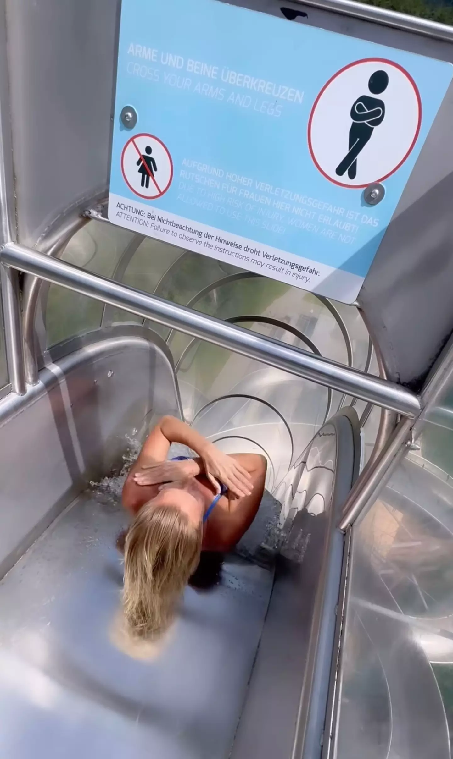 The world champion diver went down the slide despite warnings that it's not suitable for women (Instagram/@rhiannan_iffland)