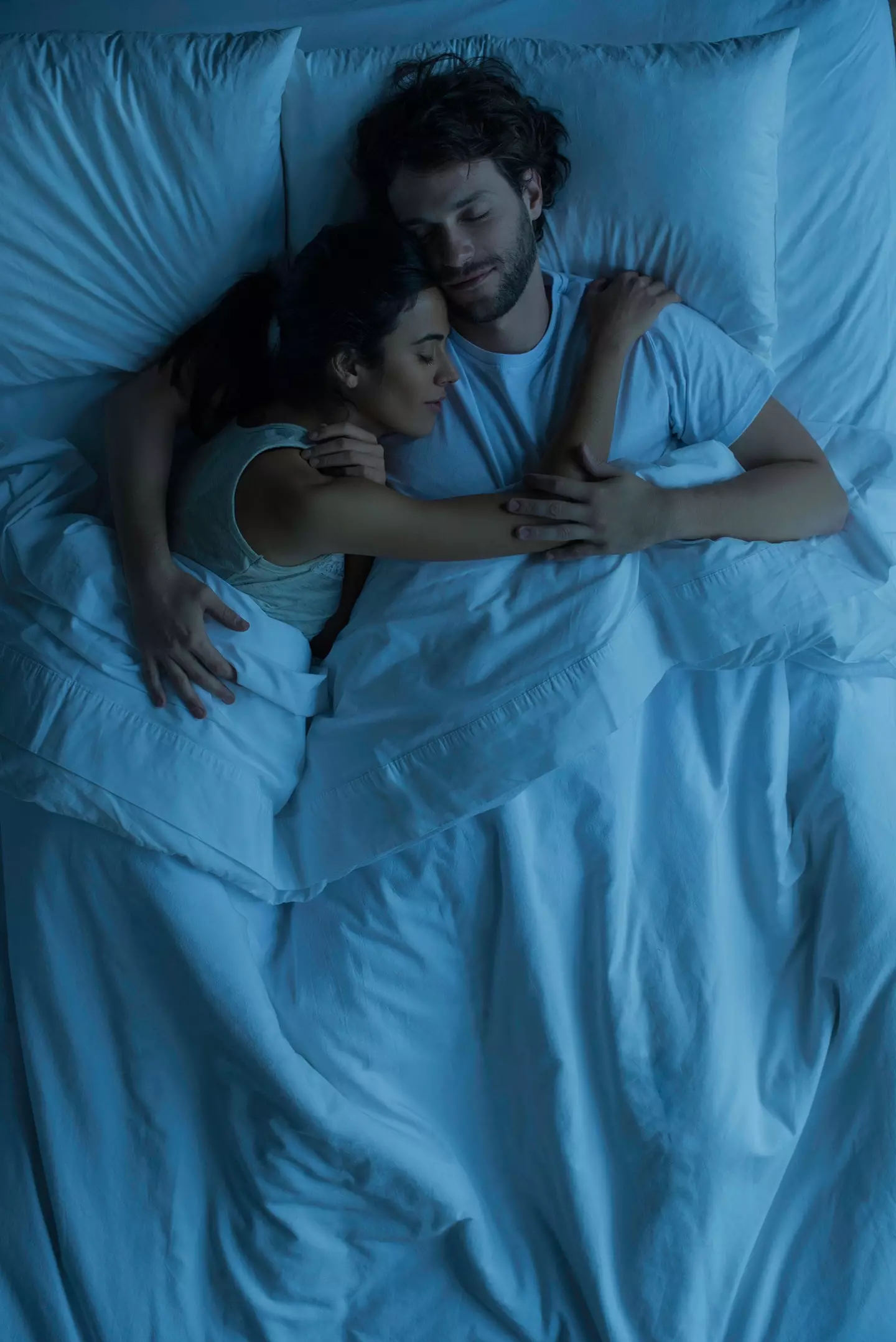 Do you sleep in the same bed as your partner? (Getty Stock Photo)