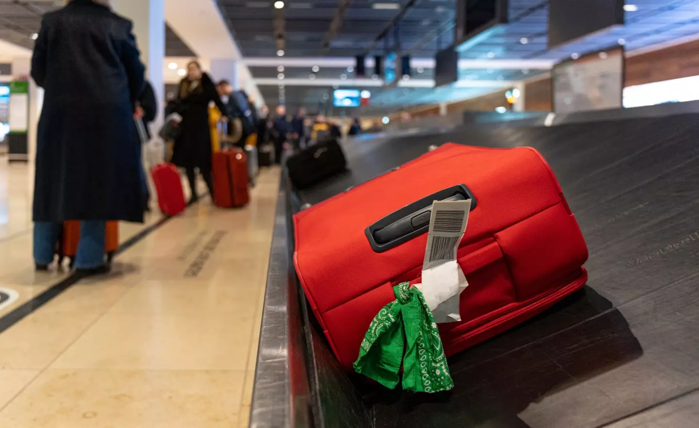 Holidaymakers might want to reconsider adding a ribbon to their suitcases (Getty stock image)