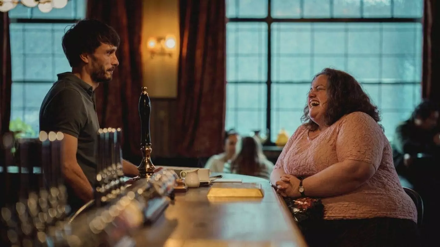 The opening scene shows Martha crying as she enters the pub. (Netflix)