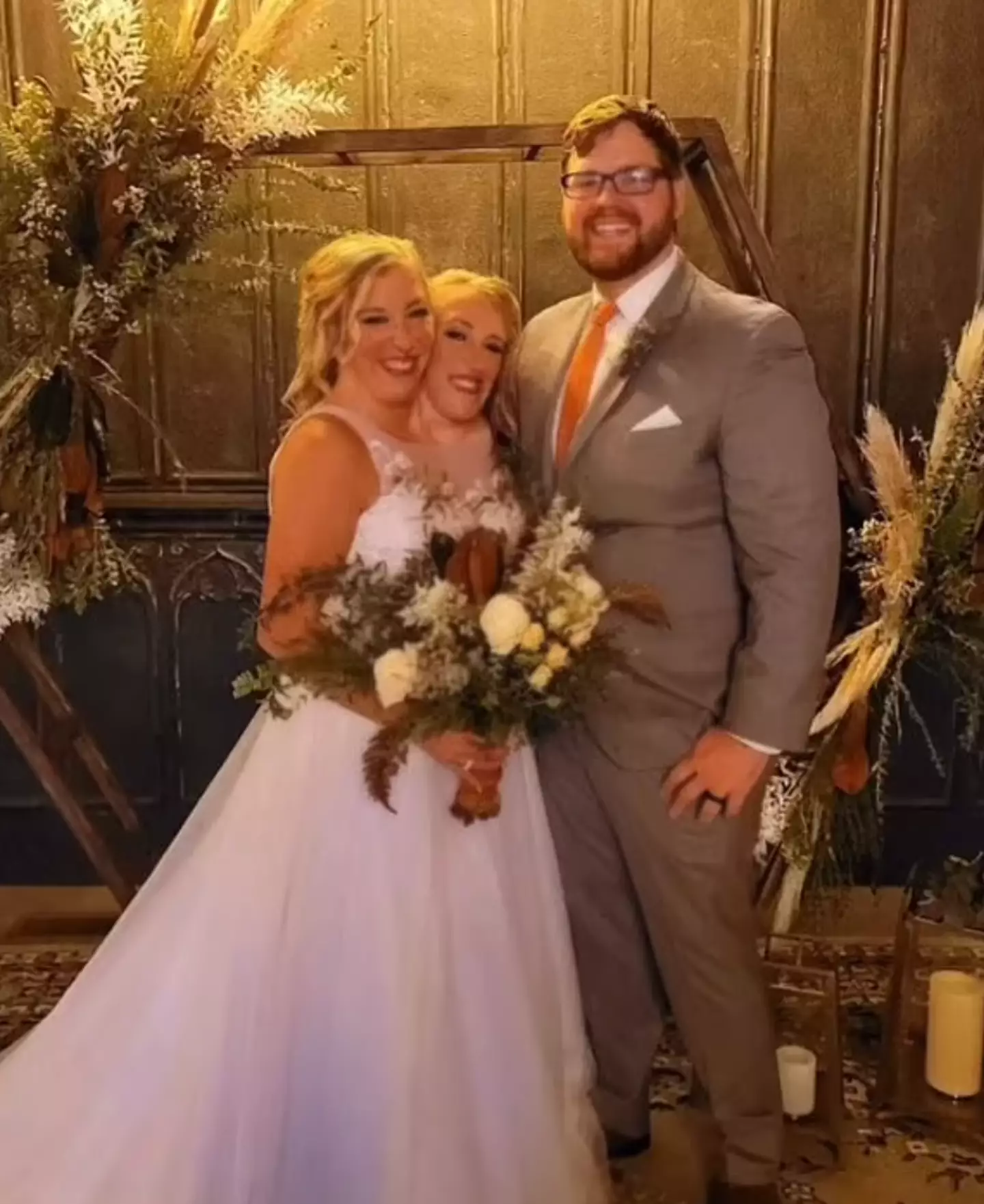 The video shared more snaps from the big day. (TikTok/Abbyandbrittanyhensel)