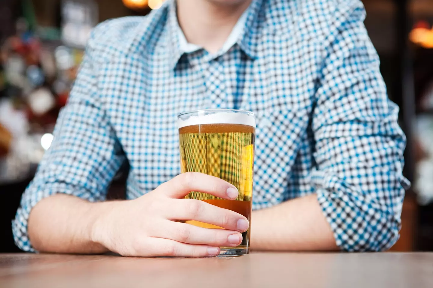 One in 20 people with Hodgkin lymphoma experience an uncomfortable symptom when drinking alcohol (Getty Stock Photos)