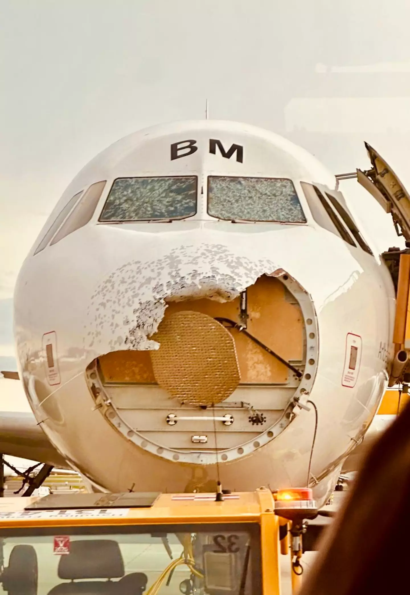 The front of the plane was battered by the storm. (@SLCScanner/X)