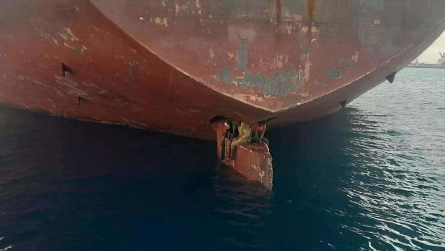 Three migrants who stowed themselves away on the rudder of a tanker have been rescued. Twitter/@salvamentogob