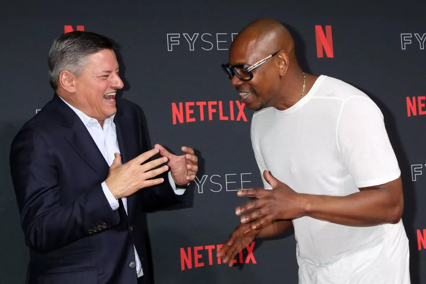 Ted Sarandos and Dave Chappelle.