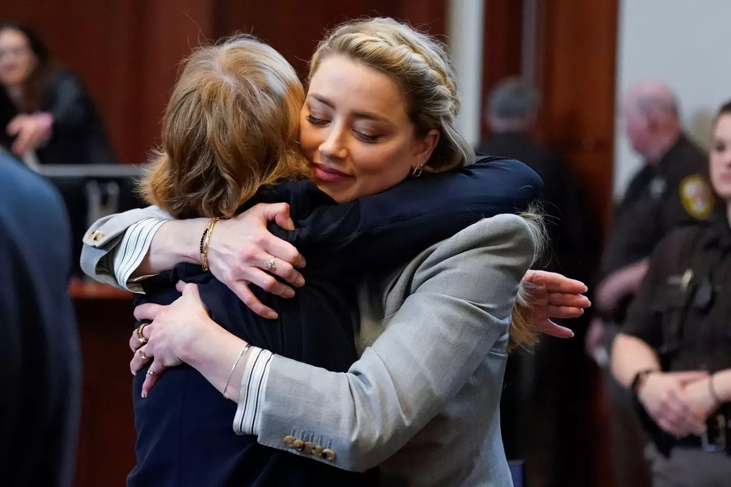 Heard hugs her attorney Elaine Bredehoft after closing arguments during her ex-husband Johnny Depp's defamation case.