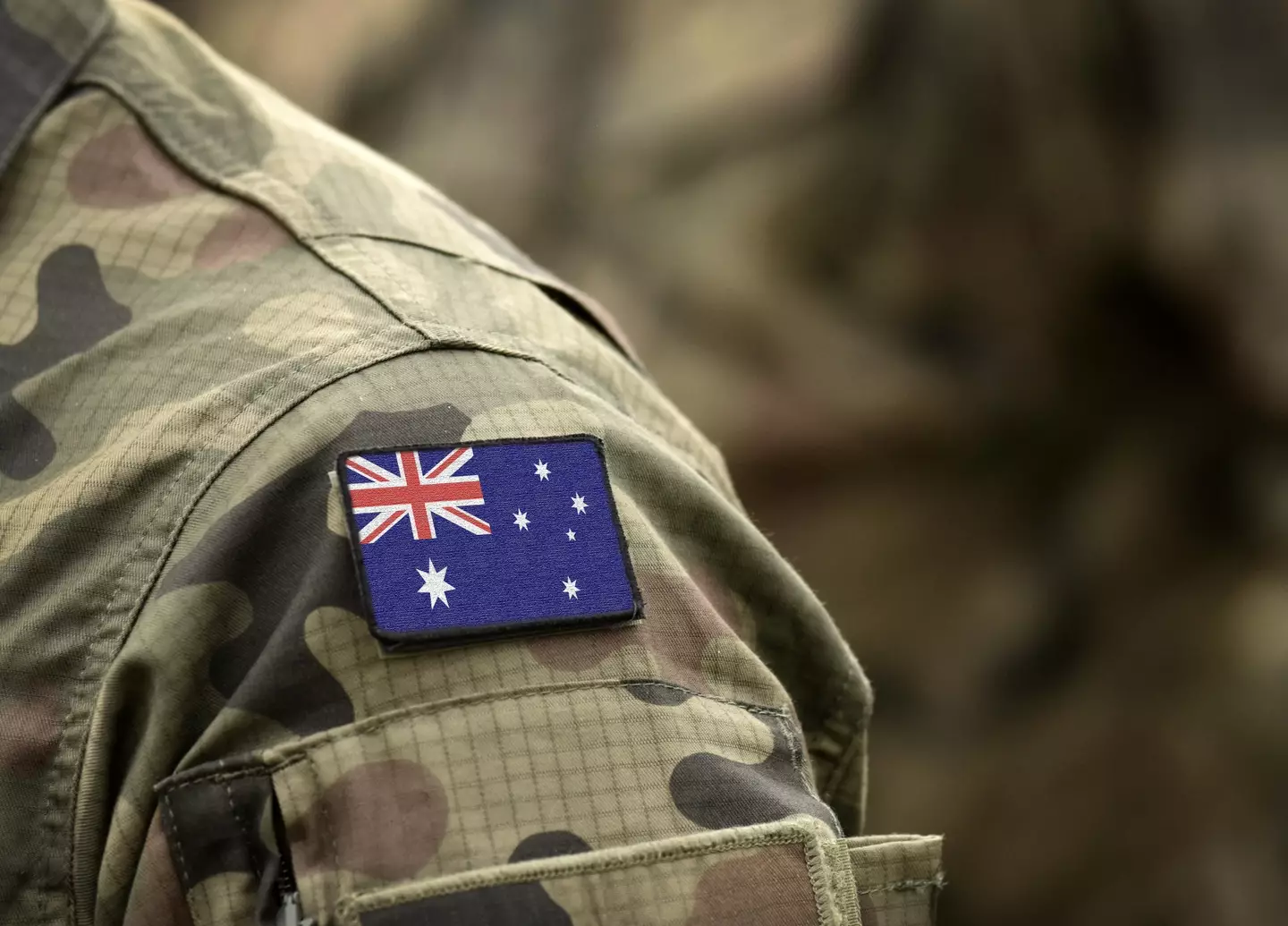 Australian flag on military uniform.