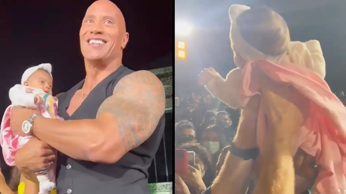 Dwayne Johnson finally explains that wild video of him holding crowd surfing baby