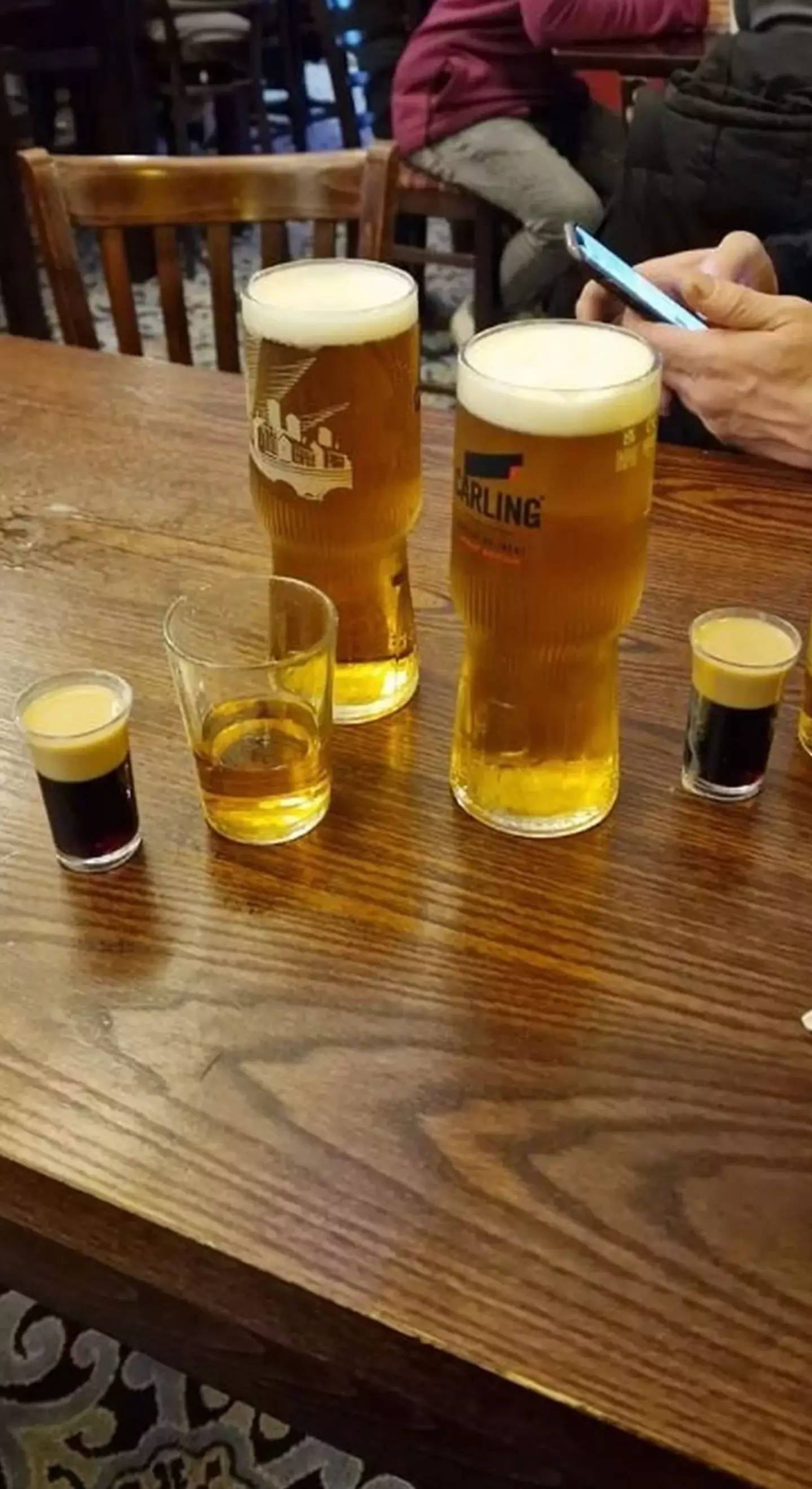 The two blokes were inundated with free drinks from strangers. (Facebook/Wetherspoons The Game)