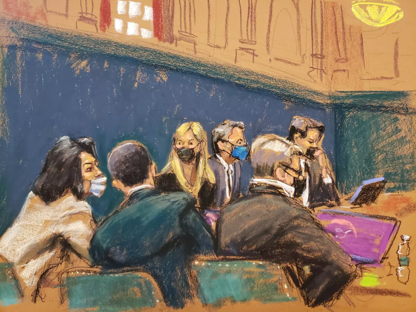 Maxwell sketched in court conferring with her defence team, who may appeal her sentence.