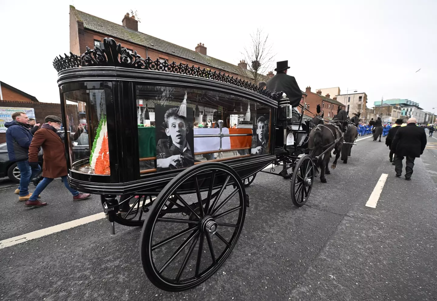 Fans, friends and mourners lined the streets for Shane MacGowan's funeral.