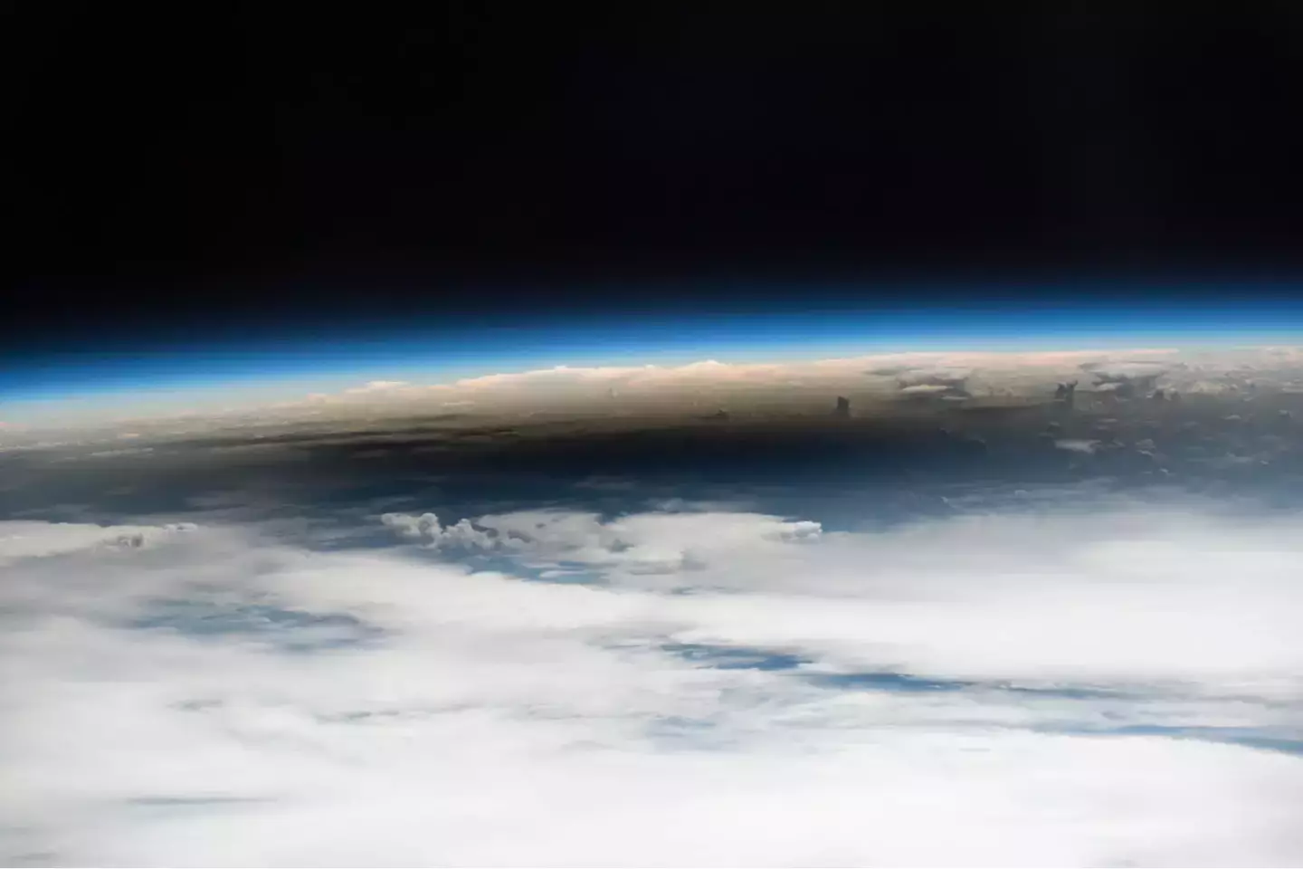 The solar eclipse as seen from space, but those on the ground thought they spotted something else. (NASA/JSC)