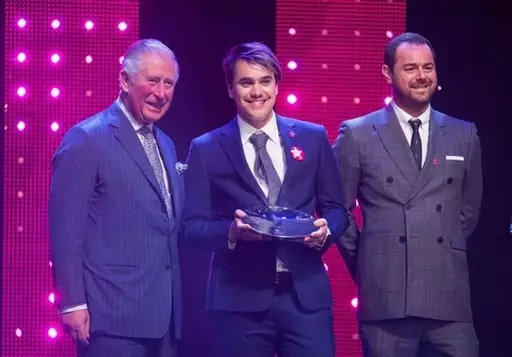 The Prince of Wales still looks amused with Danny Dyer (right) and winner of Mentor of the Year Award Rahul Mehra.