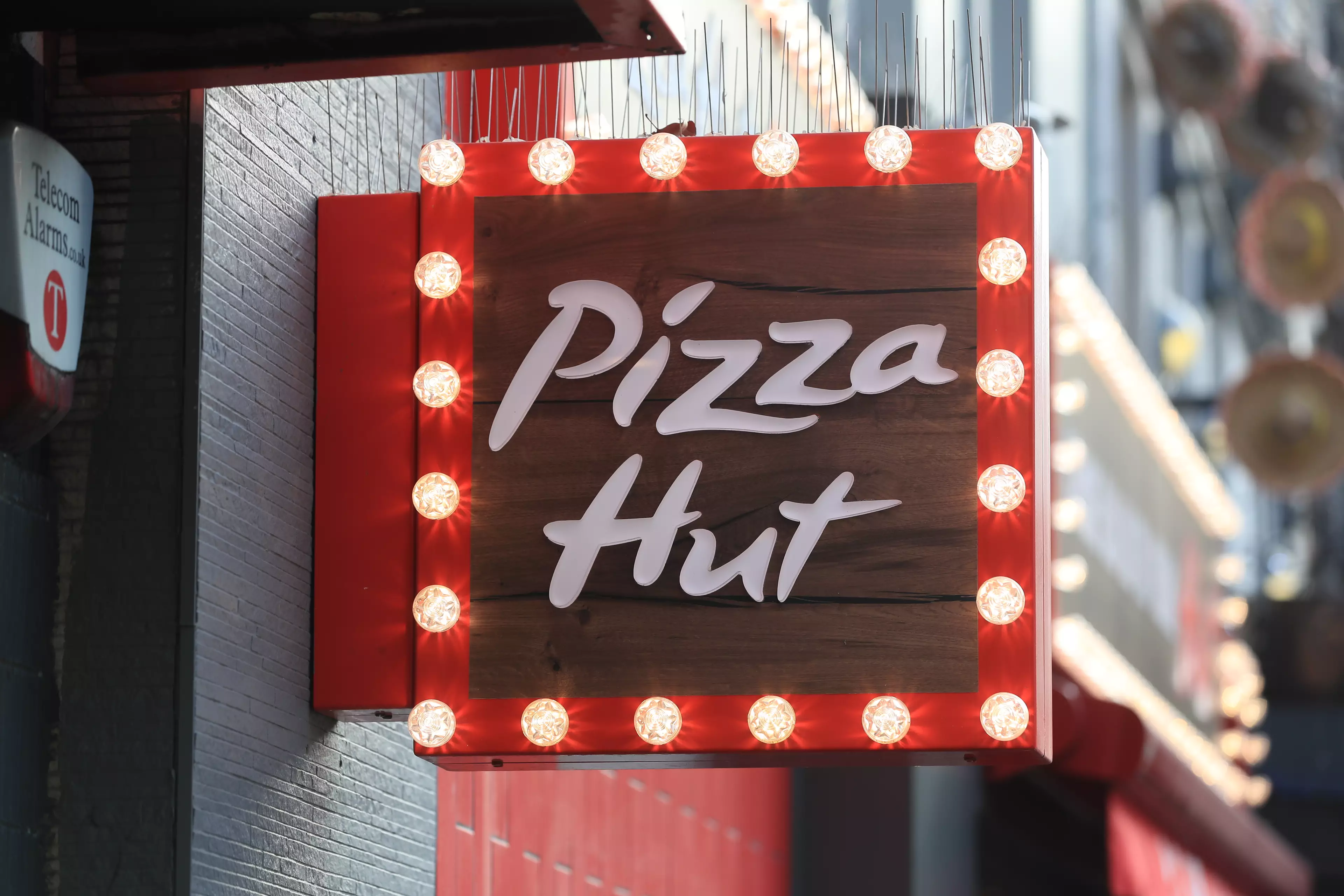 Pizza Hut sign.
