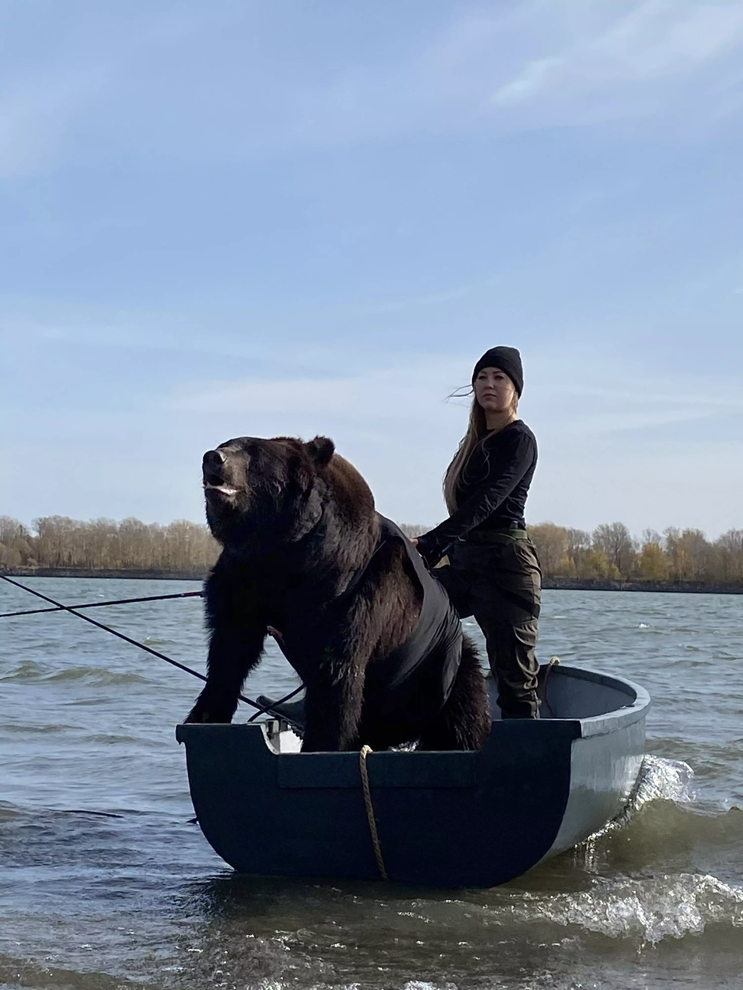 Woman Goes Fishing In Boat With Rescued Brown Bear