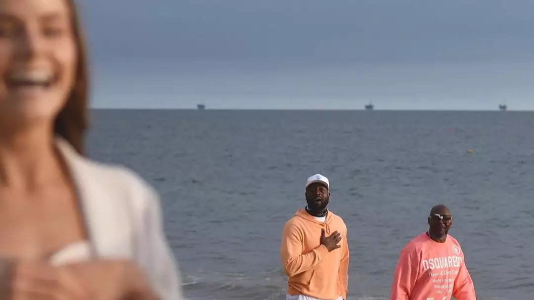Dwayne Wade Accidentally Photobombed This Couple's Beachside Marriage Proposal