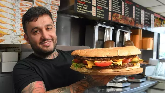 Takeaway Challenges Customers To Eat Huge Burger In 20 Minutes