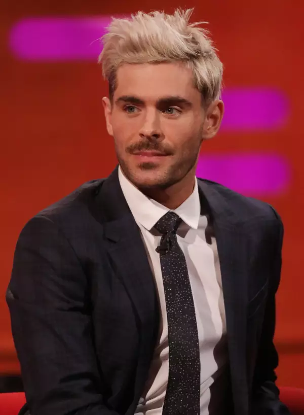 Zac Efron on The Graham Norton Show, rocking his new bleached hair.