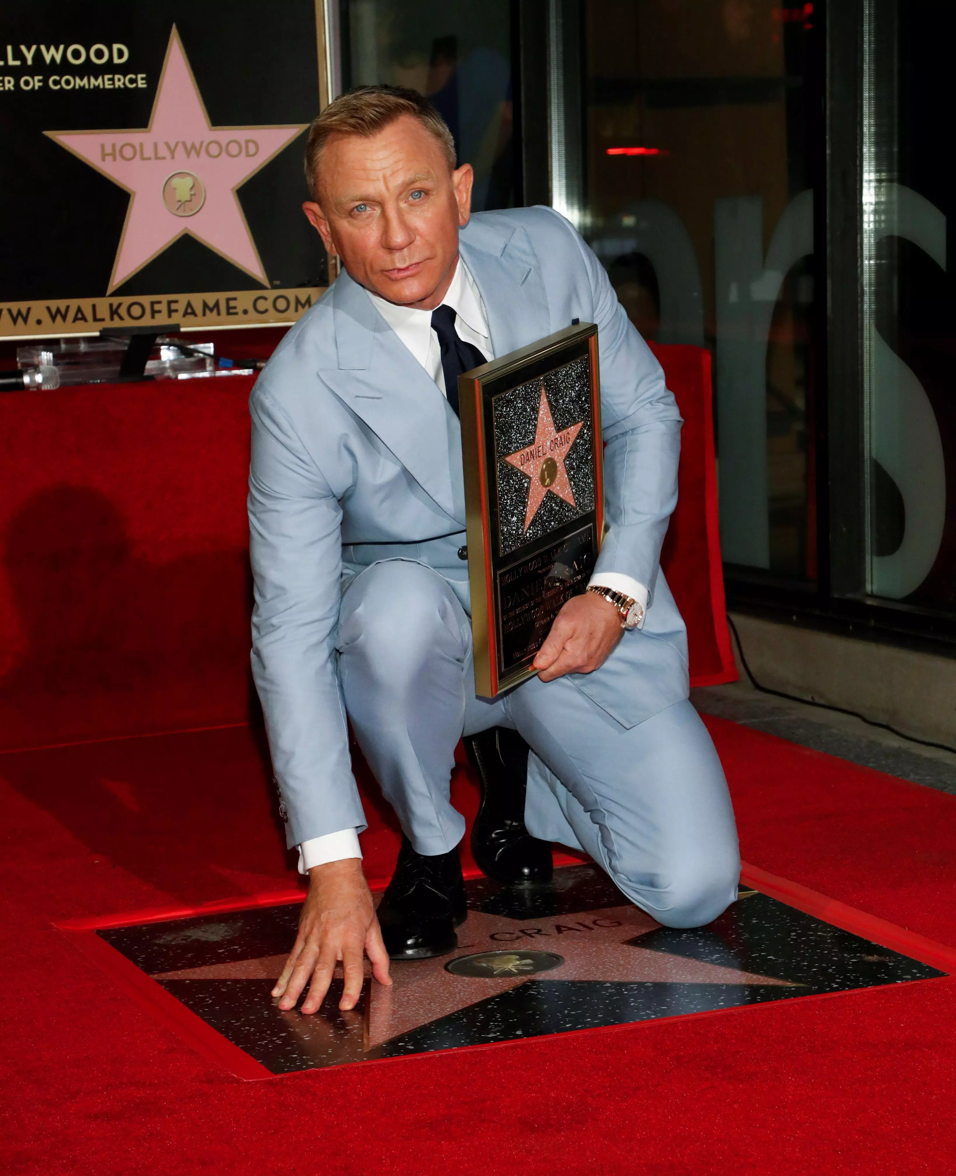 Daniel Craig poses after unveiling his star on the Hollywood Walk of Fame.