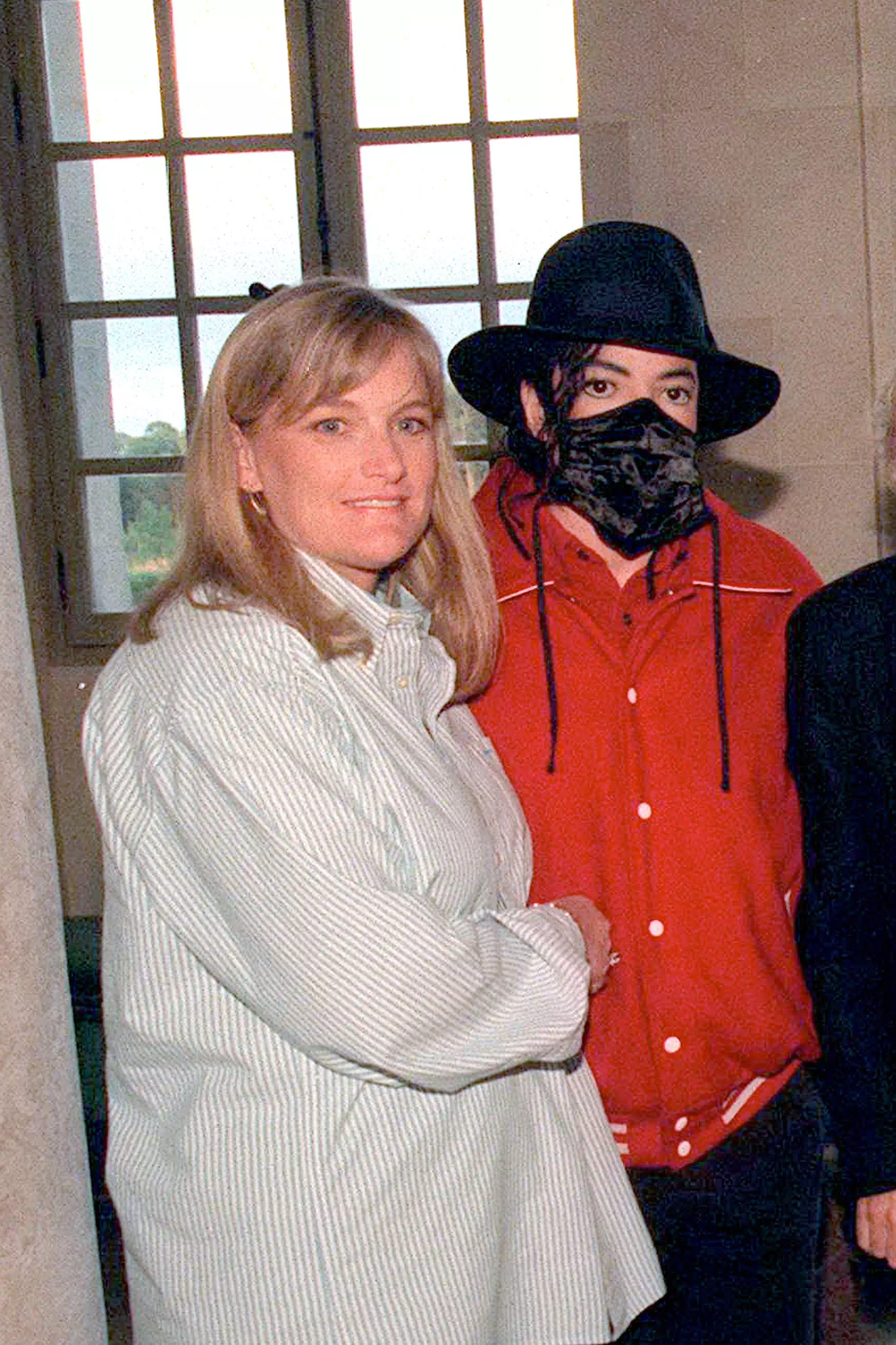 Debbie Rowe and Michael Jackson in 1997.