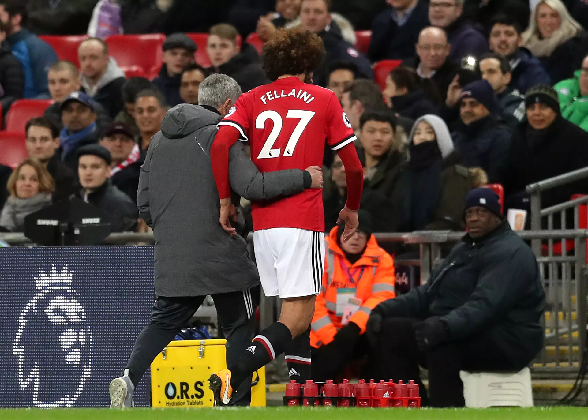 Mourinho consoles Fellaini after substituting him. Image: PA