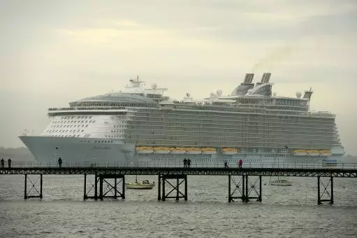 The world's largest cruise ship, MS Oasis of the Seas, owned by Royal Carribbean, makes her way up Southampton Water in 2014.