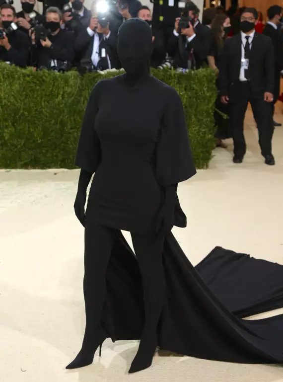 Kim Kardashian showcasing the eye-opening all-black Balenciaga outfit.