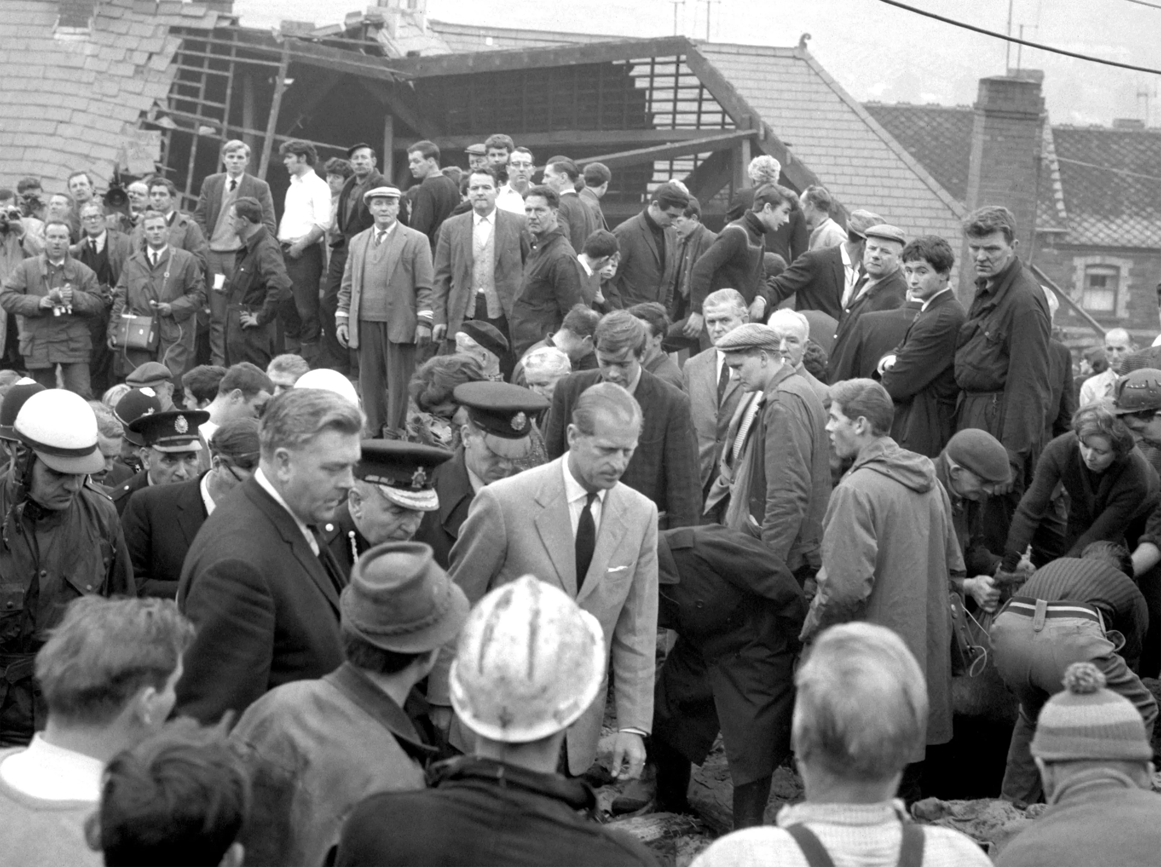 The Duke of Edinburgh visiting the disaster the following day. (