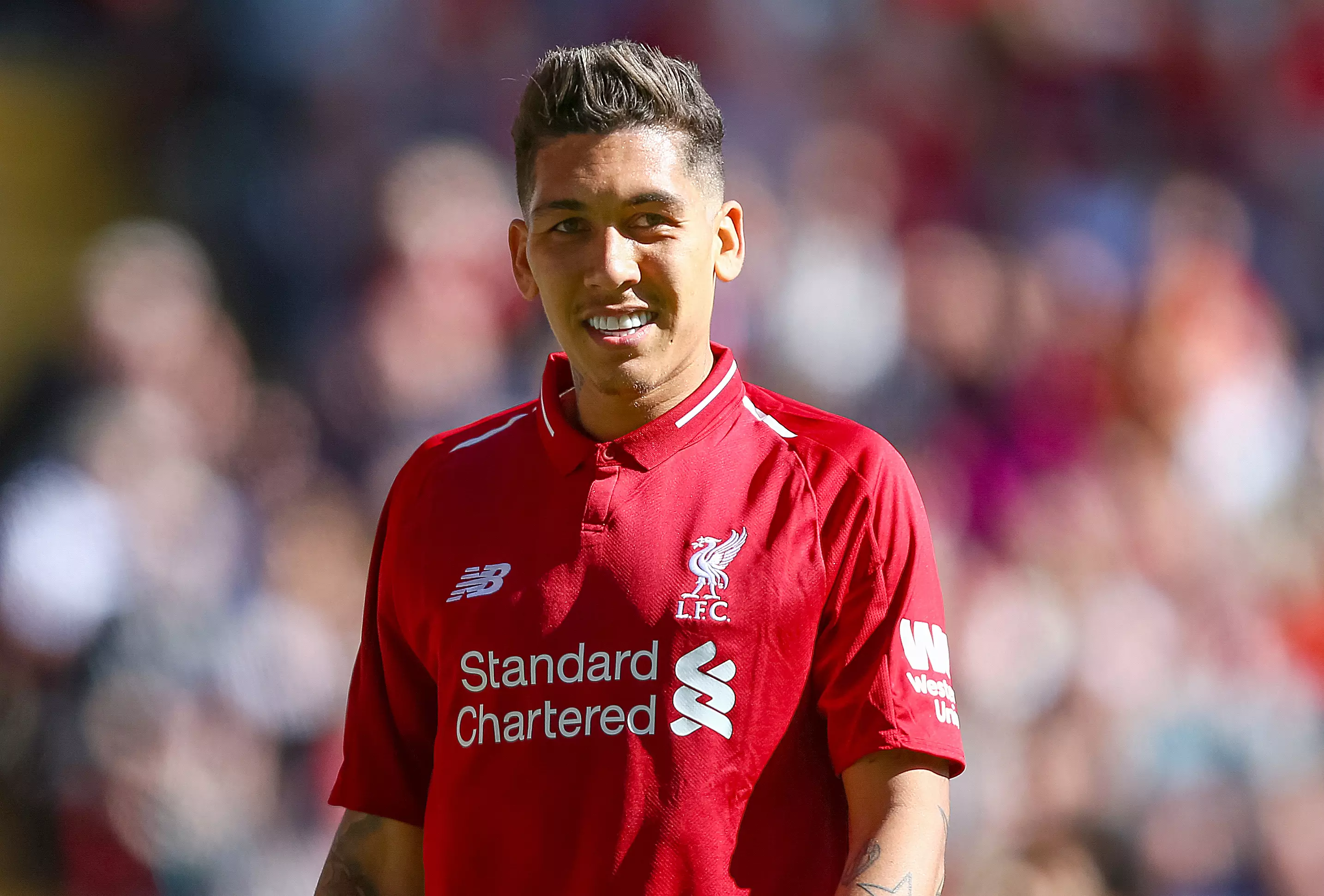 A cheeky smile from Firmino would be enough to tempt some to move. Image: PA Images
