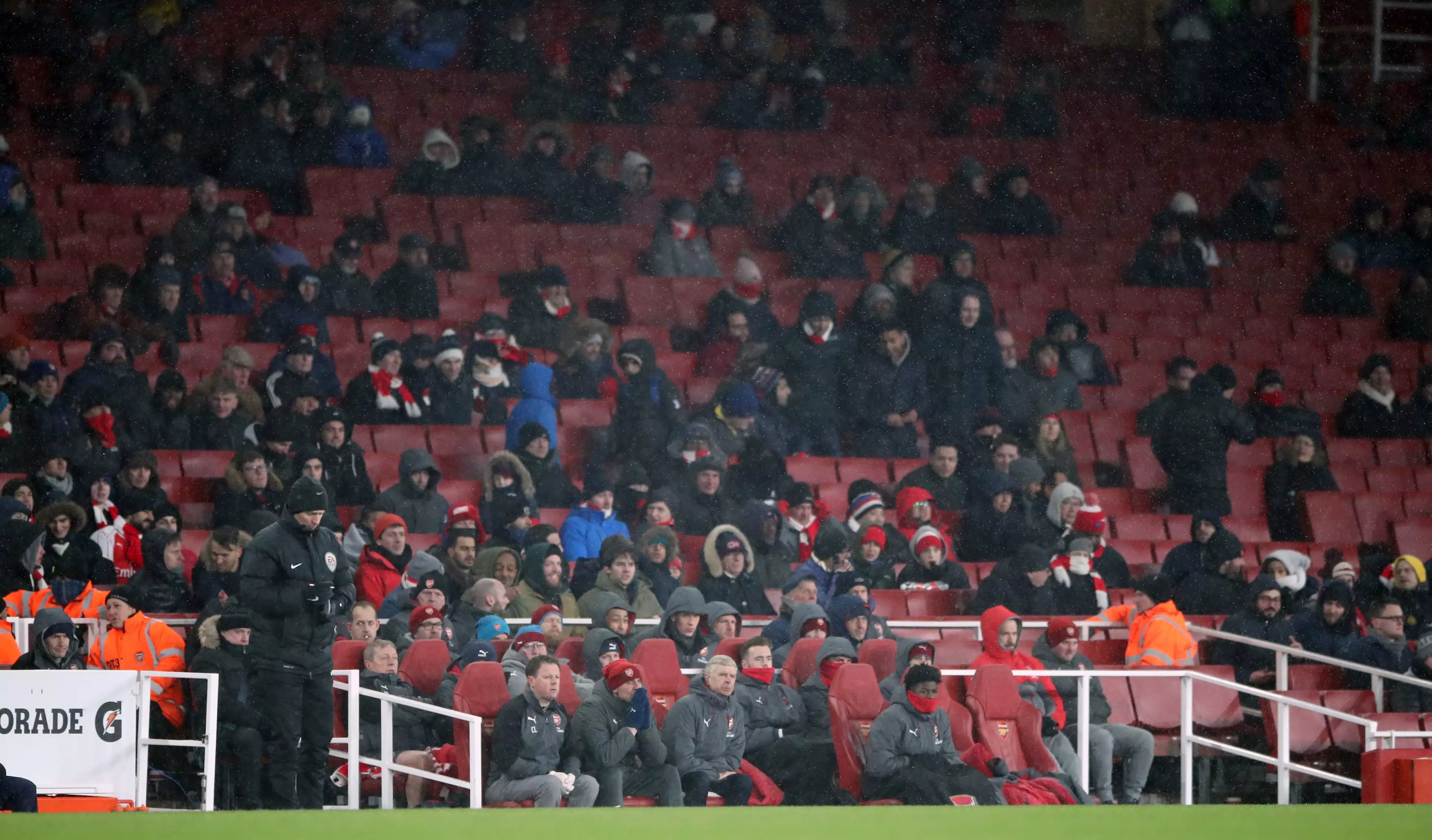 Arsenal fans watch on. Image: PA
