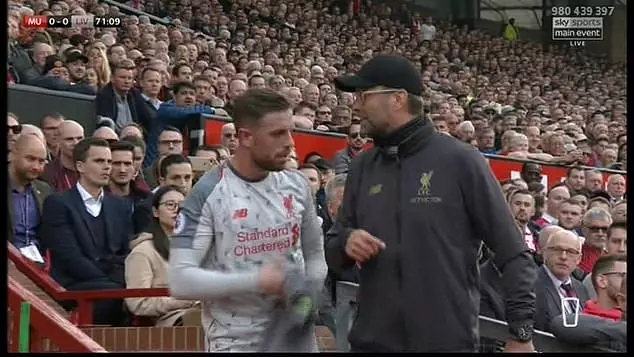 Klopp discusses with his captain. Image: Sky Sports